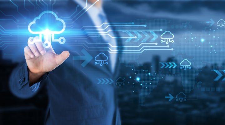 Hand touching global network connection on cloud computing.